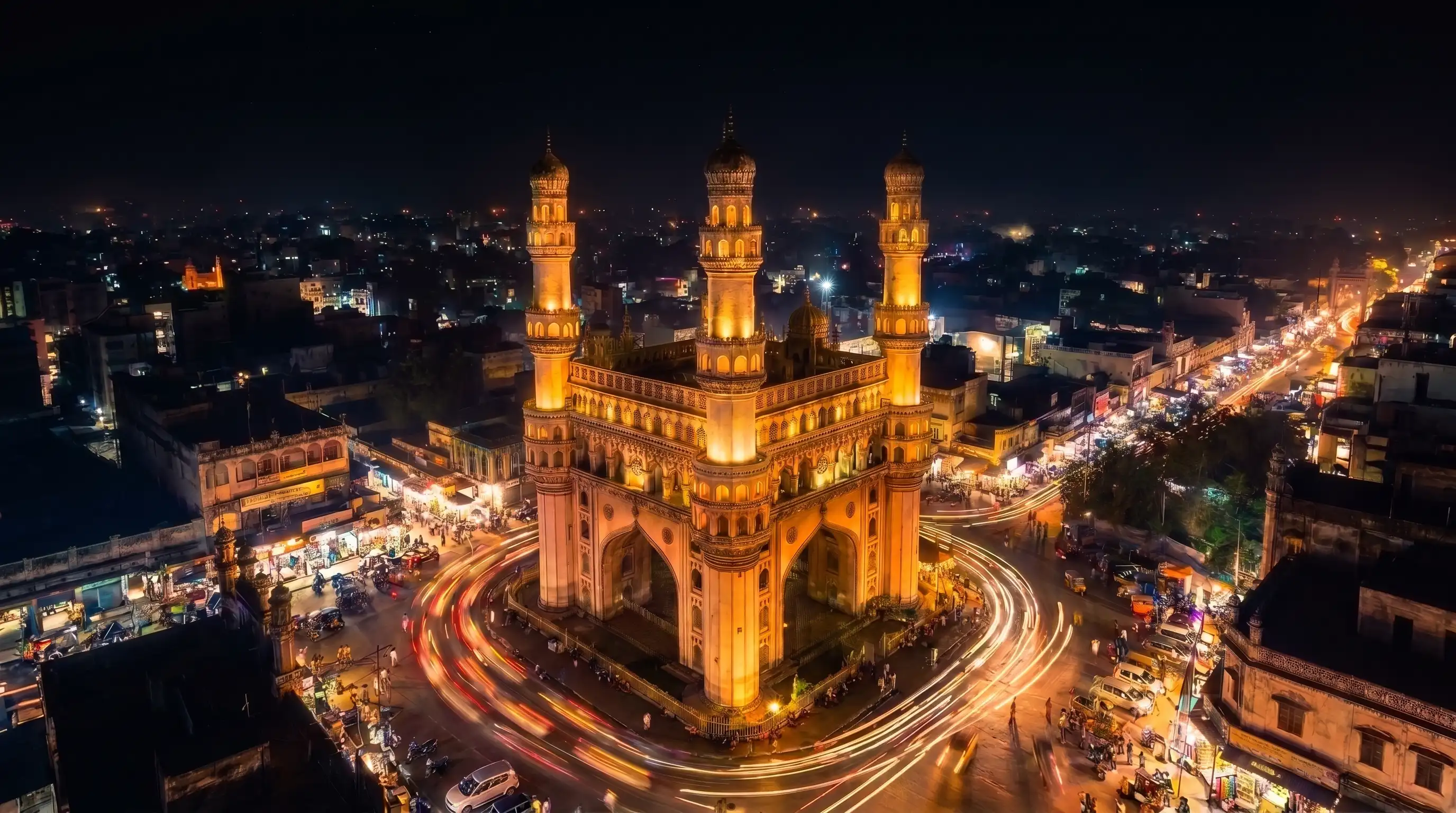 Charminar illuminated at night in Hyderabad